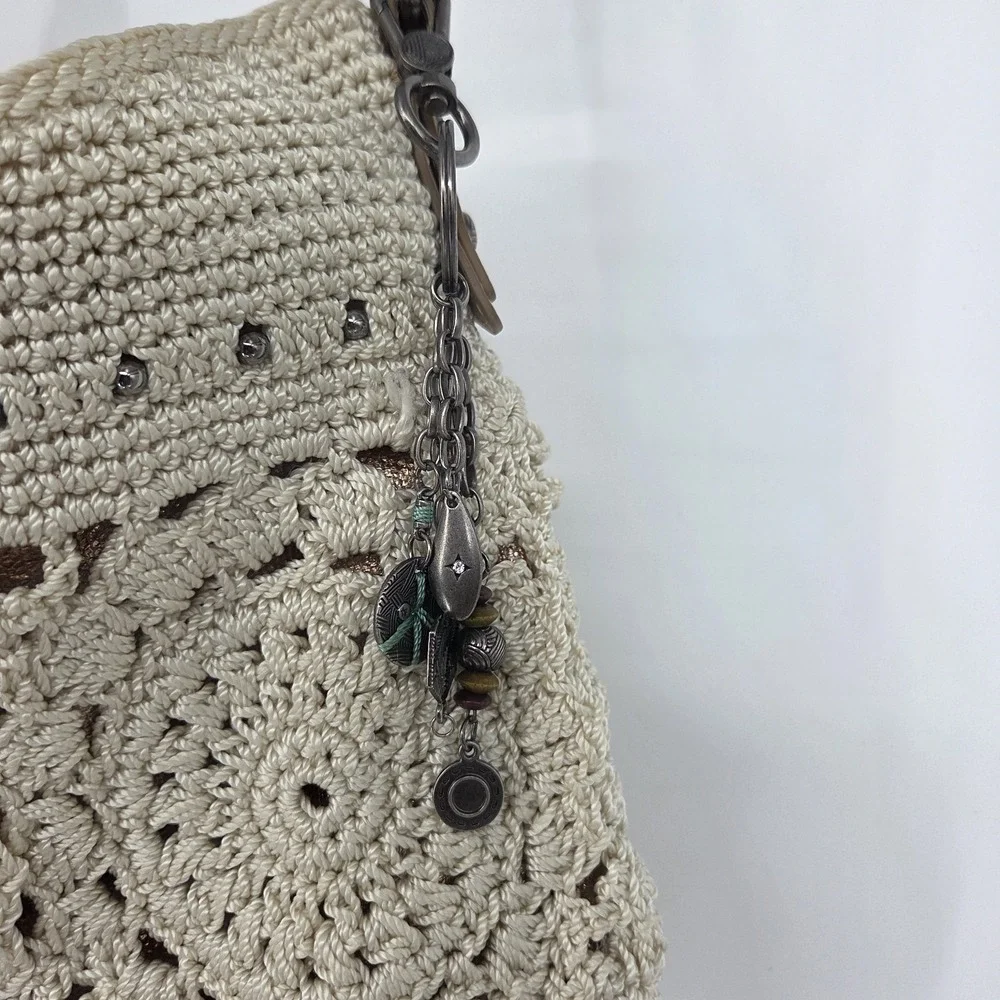 The Sak Sequoia Hobo Hand Crochet Natural Medallion Boho Shoulder Bag Charms